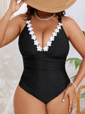 Plus Size Black One-Piece Swimsuit with Colorful Floral Trim