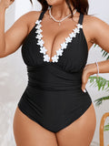 Plus Size Black One-Piece Swimsuit with Colorful Floral Trim